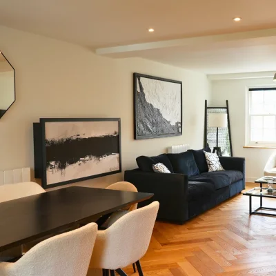 DropTop Duo in black, closed position styled within a modern living room.