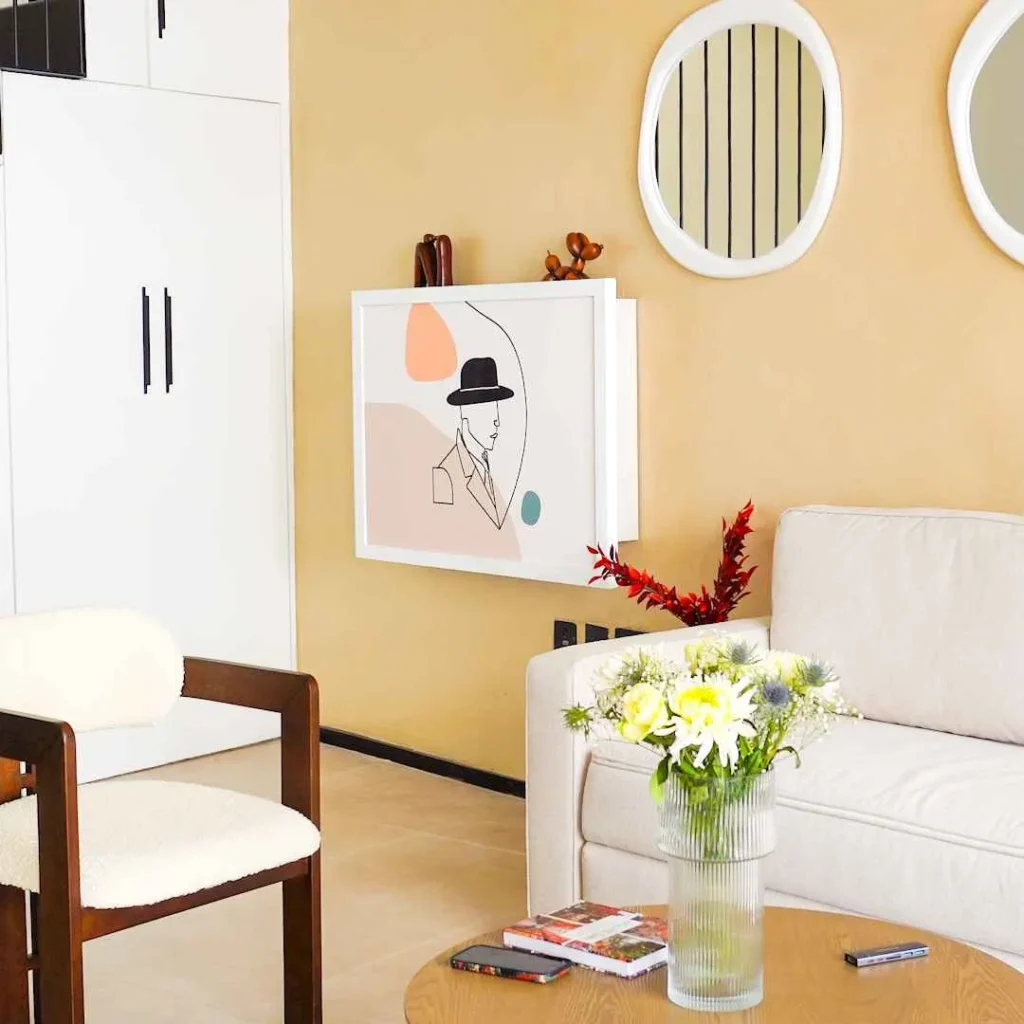 Space saving fold down desk blended into modern home decor with minimalist wall art design