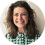 Smiling woman portrait used as a customer icon.