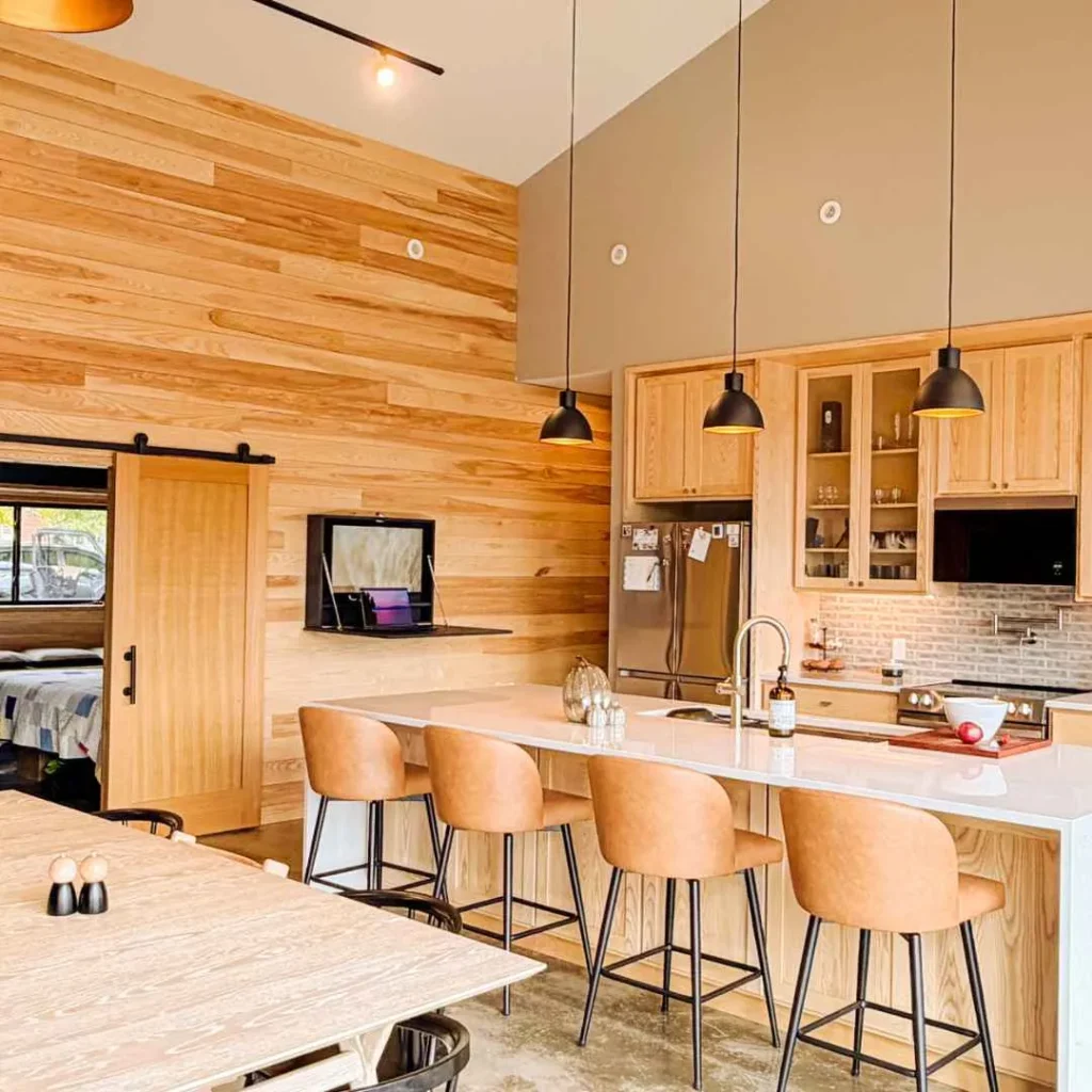 Wall mounted desk creating a discreet workspace in a modern home environment