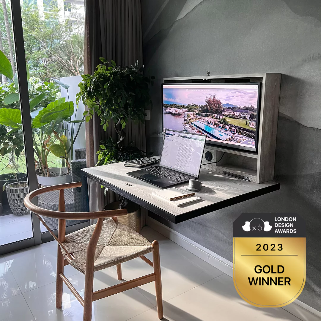 Open DropTop desk with monitor and laptop setup in a modern home office.