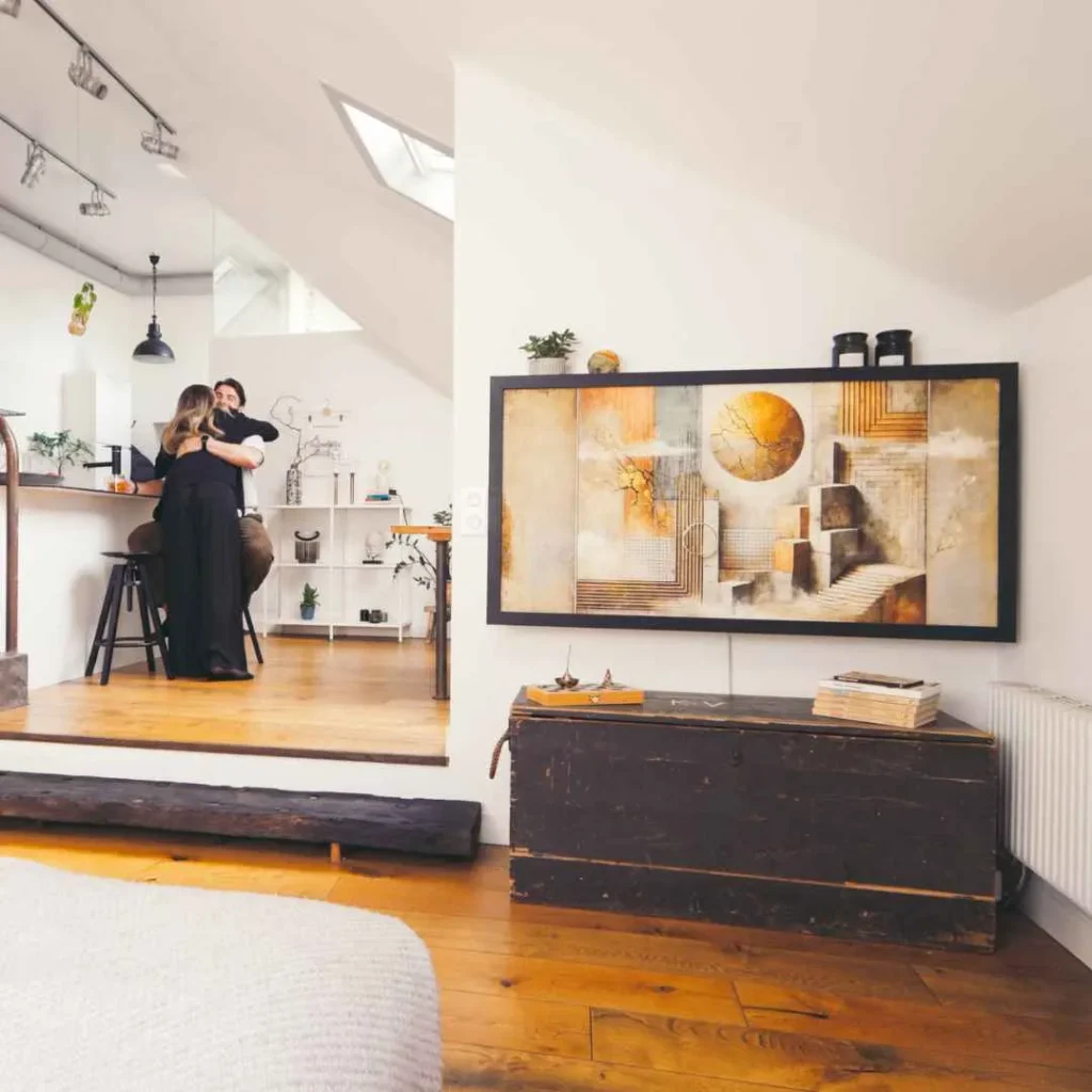DropTop desk closed, styled as a framed abstract artwork display on the front panel.