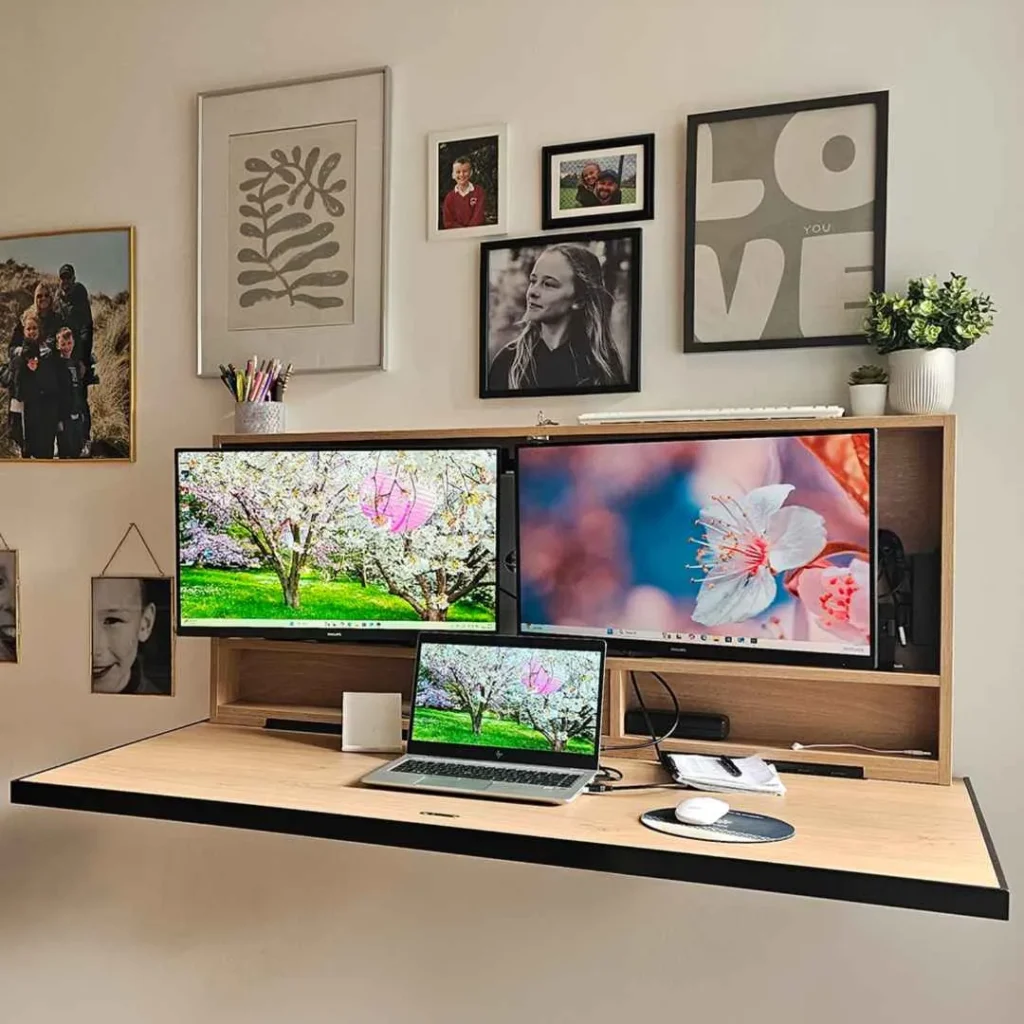 Open DropTop desk with dual monitor and laptop setup in a home workspace.