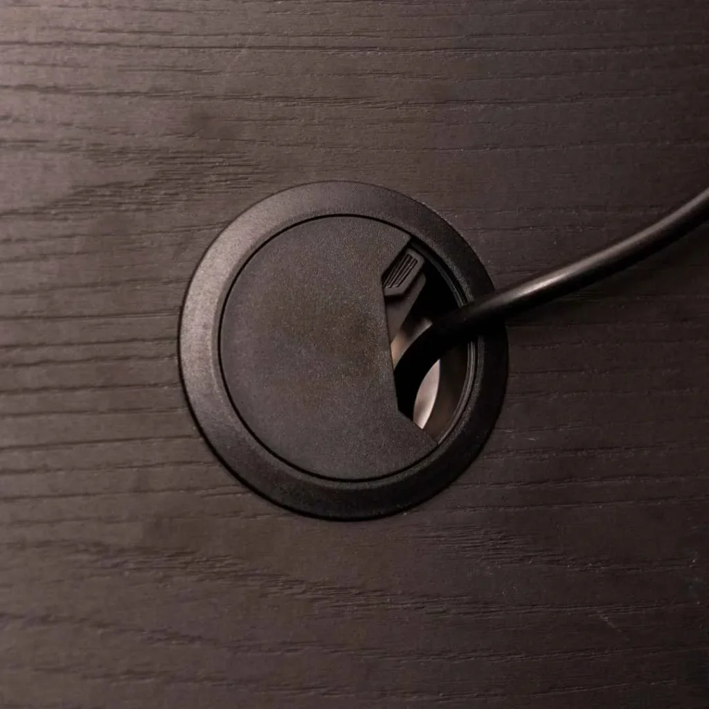 Built in desk cable port with sliding cover for organised cable management