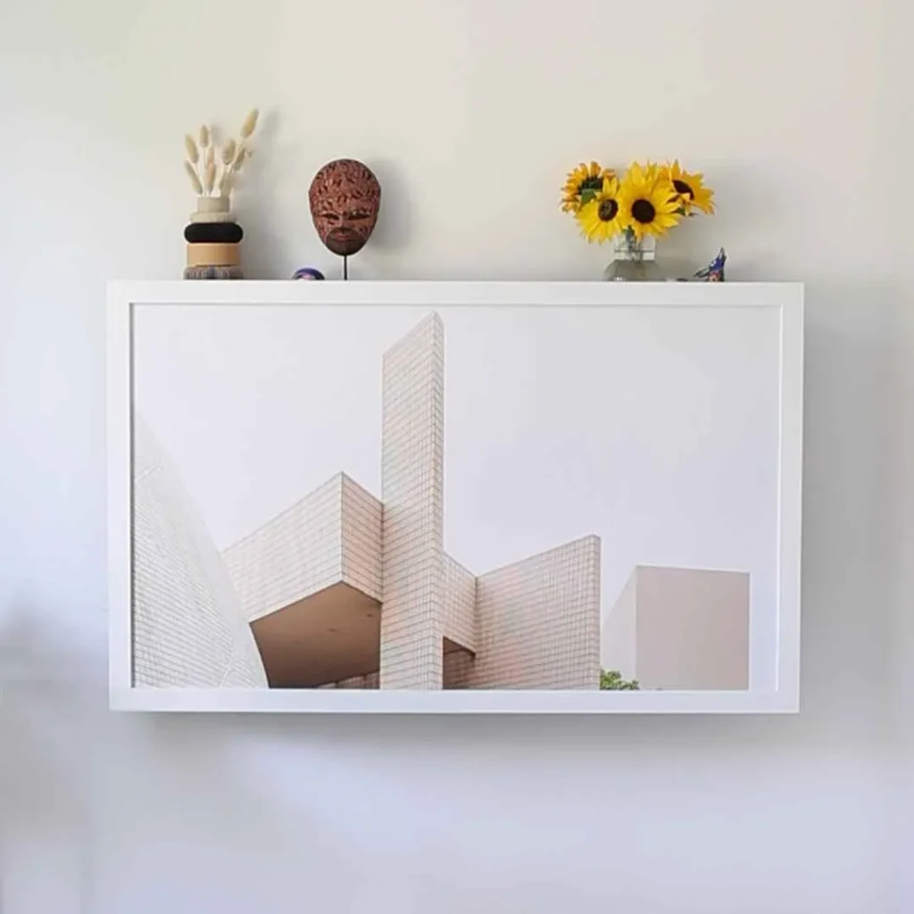 Concealed desk blending storage and workspace into wall decor