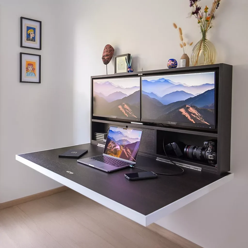 Open DropTop desk with dual monitors, laptop, and workspace accessories.